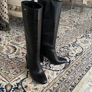 Like new, black leather healed boots